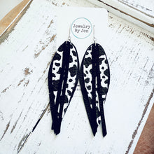 Load image into Gallery viewer, Narrow Fringe Feather Earrings: Black &amp; Cow Print