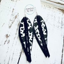 Load image into Gallery viewer, Narrow Fringe Feather Earrings: Black &amp; Cow Print