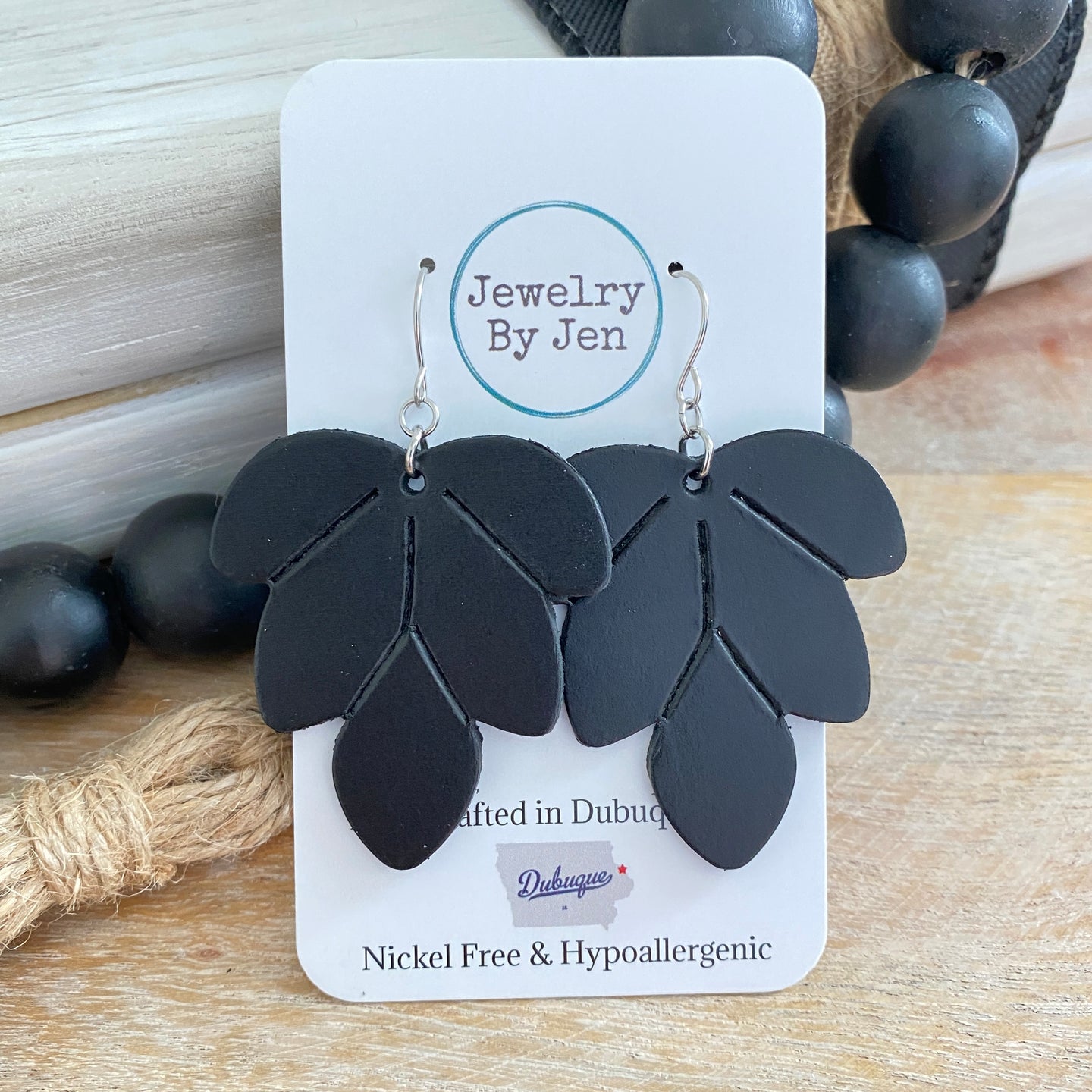 Embossed Leaf Earrings: Black